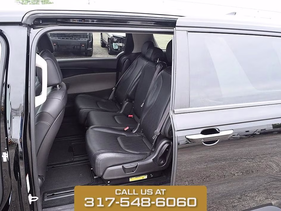 2025 Aurora Black Kia Carnival LXS FWD Van