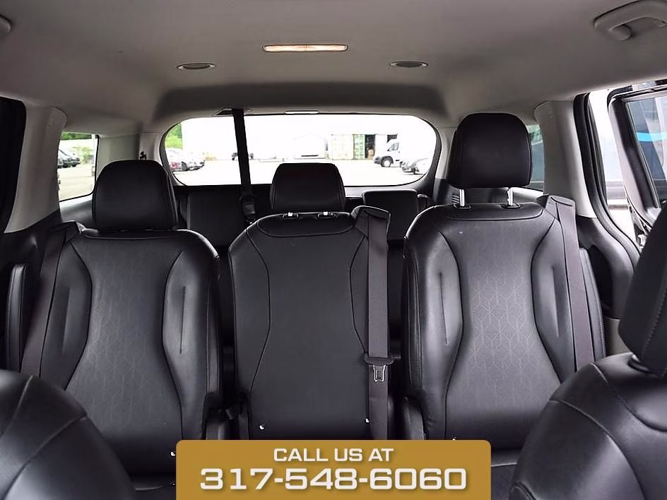 2025 Aurora Black Kia Carnival LXS FWD Van