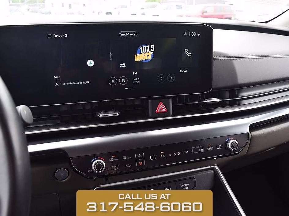 2025 Aurora Black Kia Carnival LXS FWD Van