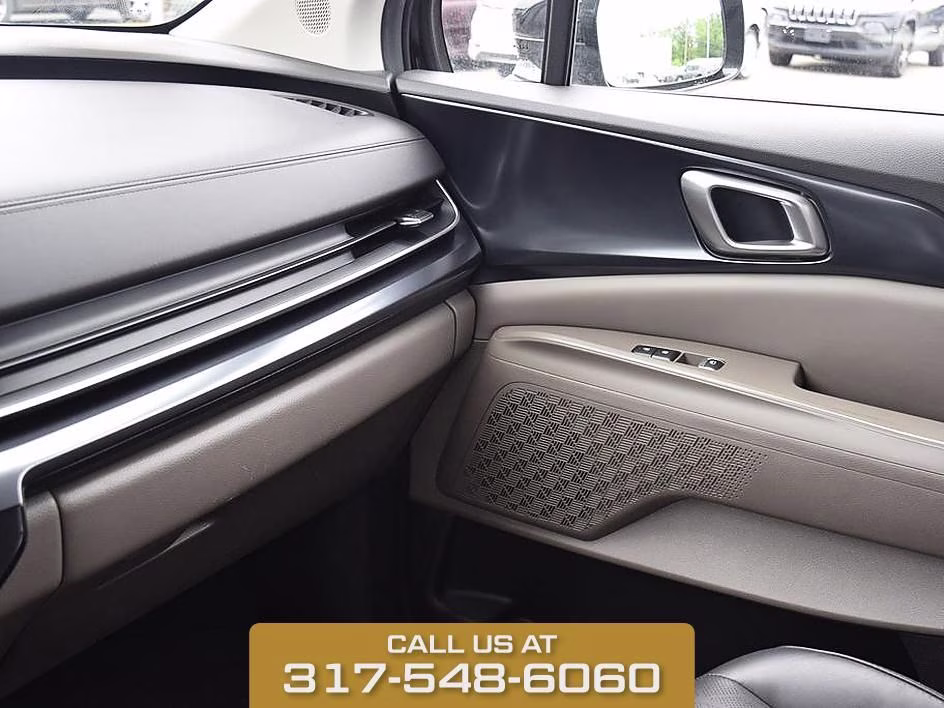 2025 Aurora Black Kia Carnival LXS FWD Van