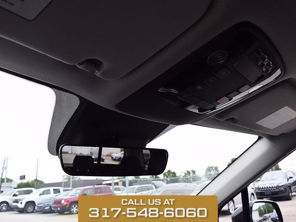 2025 Aurora Black Kia Carnival LXS FWD Van