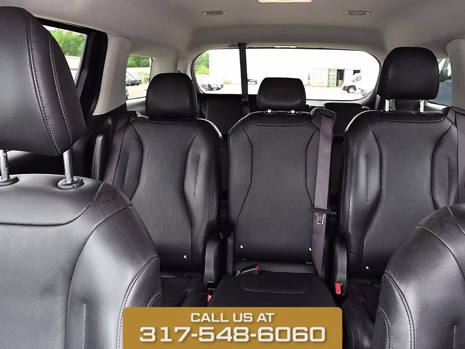 2025 Aurora Black Kia Carnival LXS FWD Van