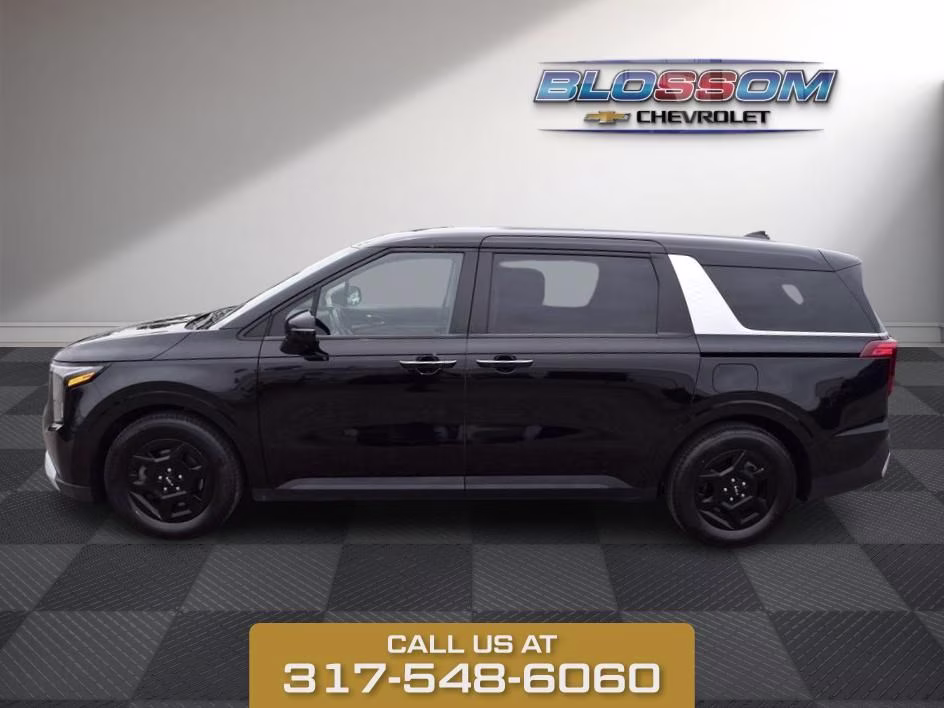 2025 Aurora Black Kia Carnival LXS FWD Van