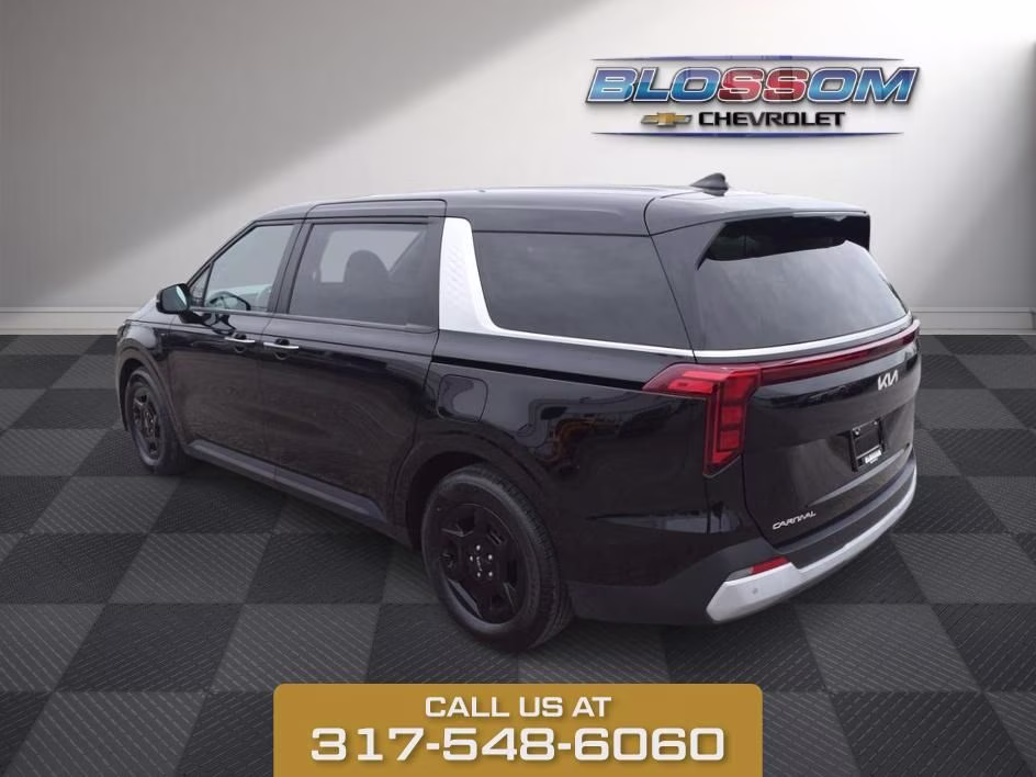 2025 Aurora Black Kia Carnival LXS FWD Van