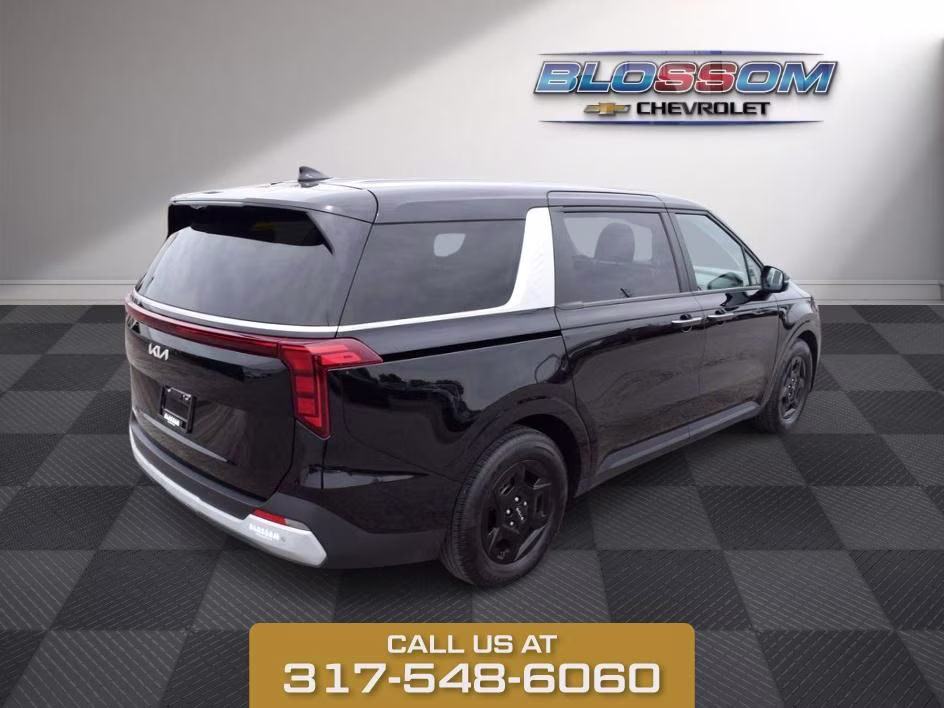 2025 Aurora Black Kia Carnival LXS FWD Van