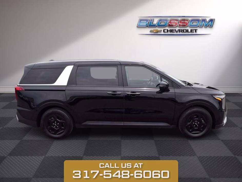 2025 Aurora Black Kia Carnival LXS FWD Van