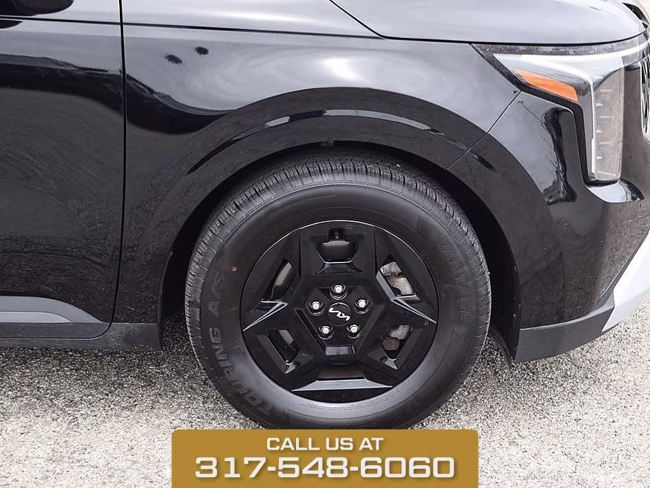 2025 Aurora Black Kia Carnival LXS FWD Van