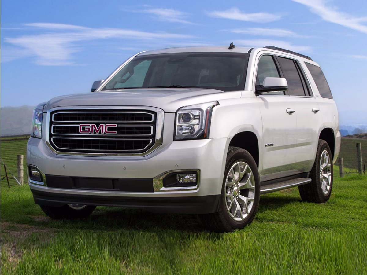 2016 Sparkling Silver Metallic GMC Yukon SLT RWD SUV