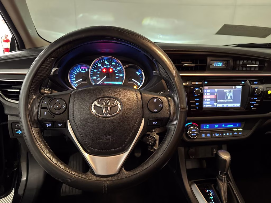 2016 Black Sand Pearl Toyota Corolla LE FWD Sedan
