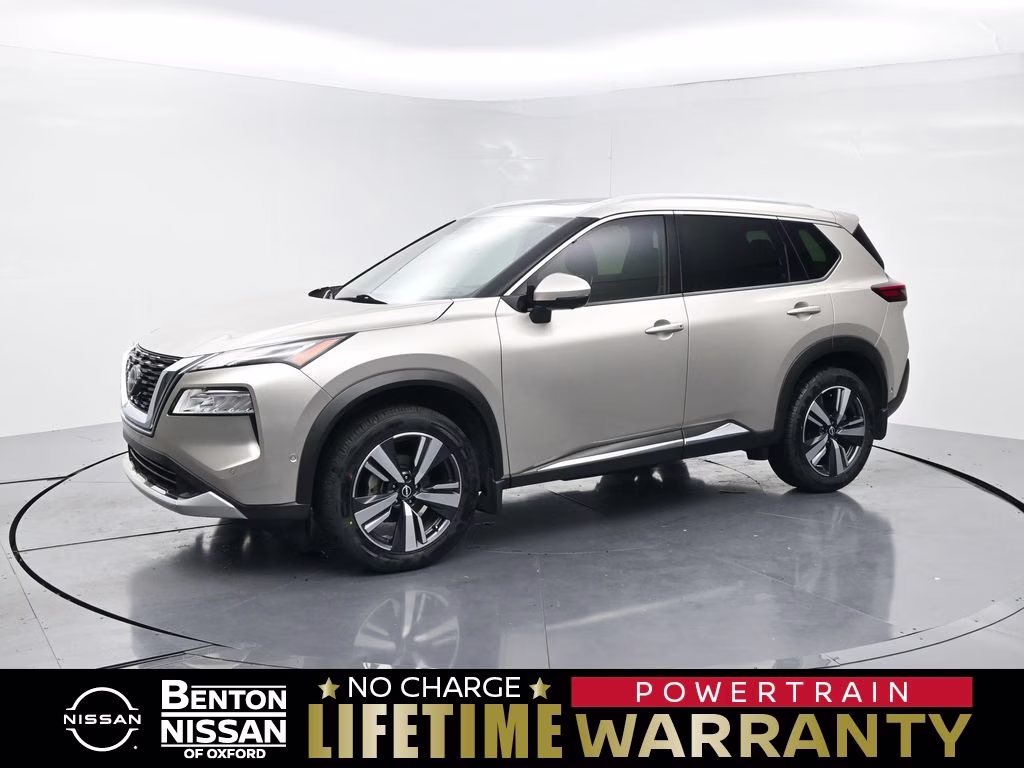 2023 Champagne Silver Metallic Nissan Rogue Platinum FWD SUV