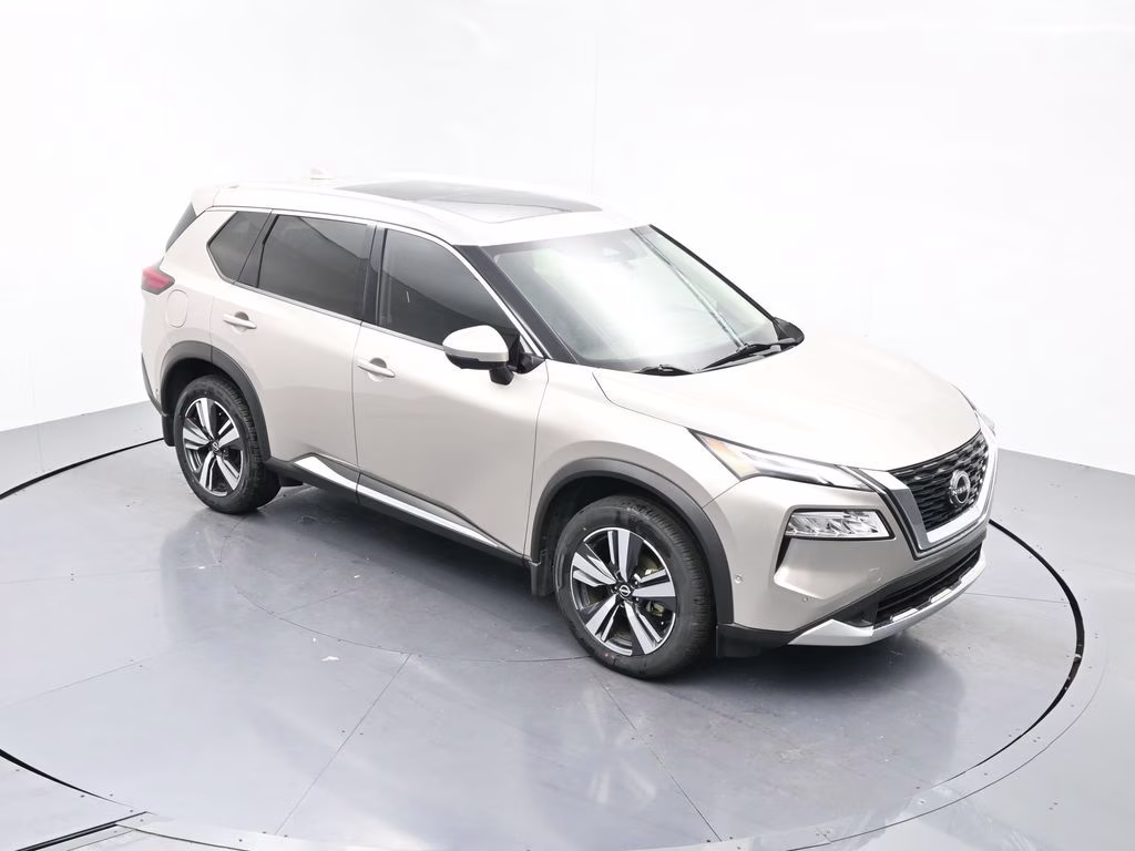 2023 Champagne Silver Metallic Nissan Rogue Platinum FWD SUV