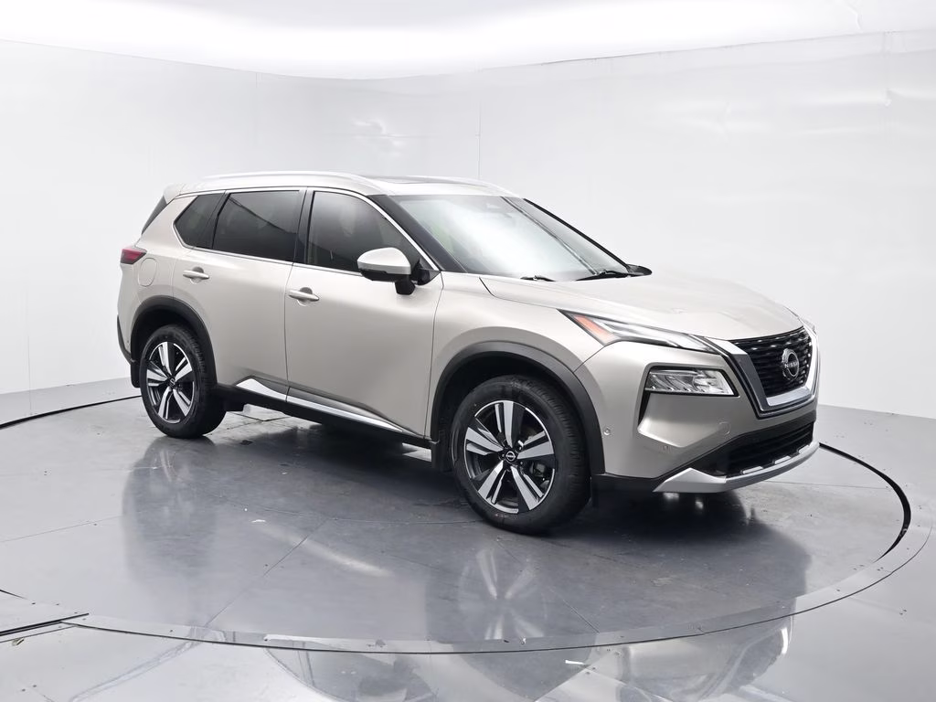 2023 Champagne Silver Metallic Nissan Rogue Platinum FWD SUV
