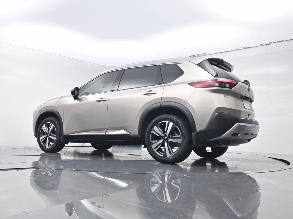 2023 Champagne Silver Metallic Nissan Rogue Platinum FWD SUV