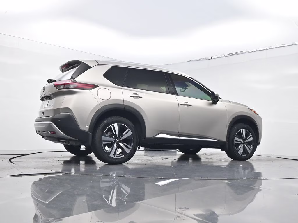 2023 Champagne Silver Metallic Nissan Rogue Platinum FWD SUV