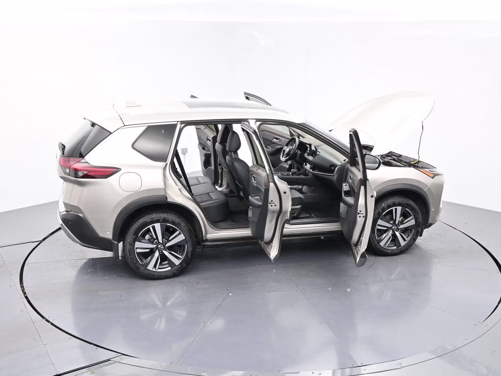 2023 Champagne Silver Metallic Nissan Rogue Platinum FWD SUV