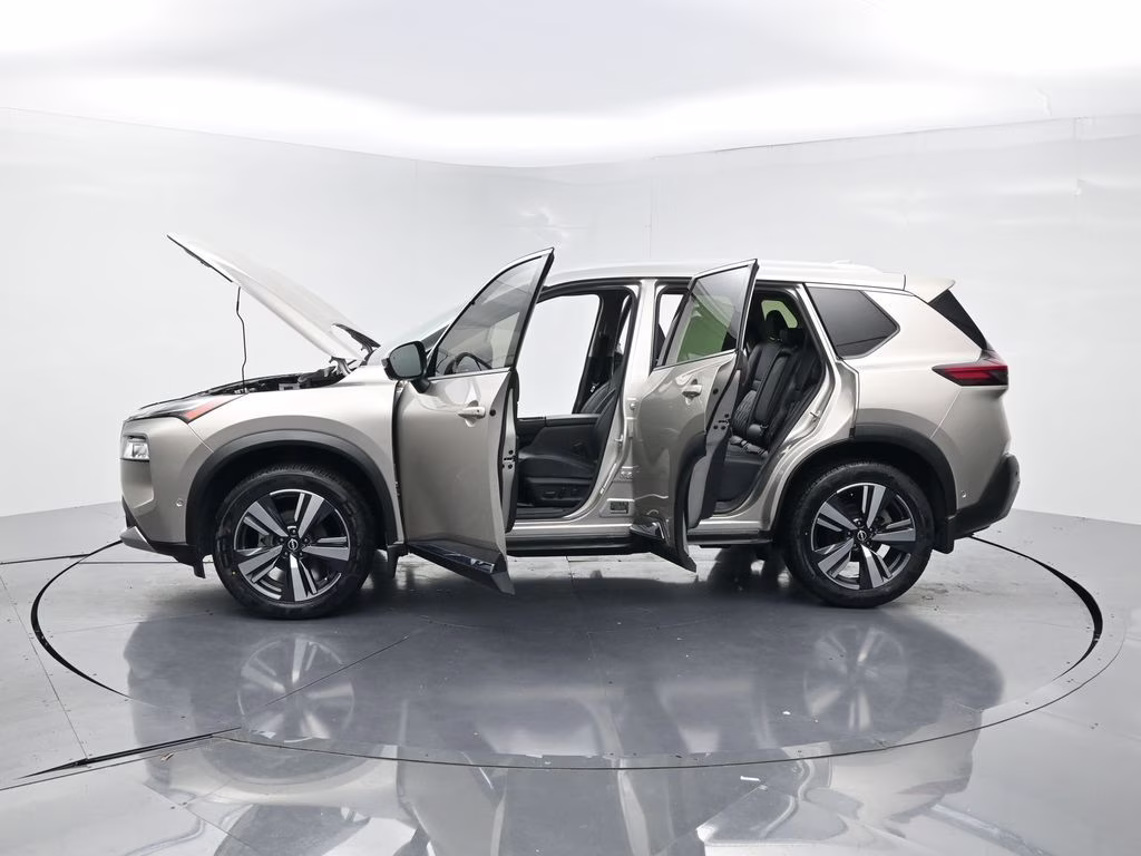 2023 Champagne Silver Metallic Nissan Rogue Platinum FWD SUV