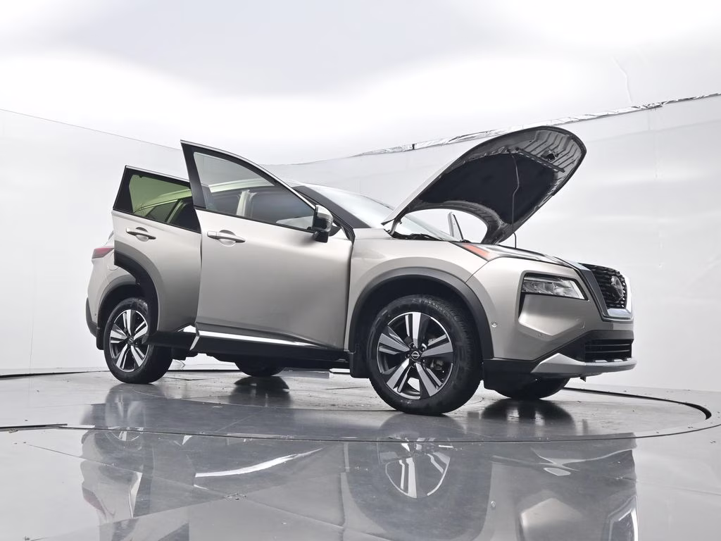 2023 Champagne Silver Metallic Nissan Rogue Platinum FWD SUV