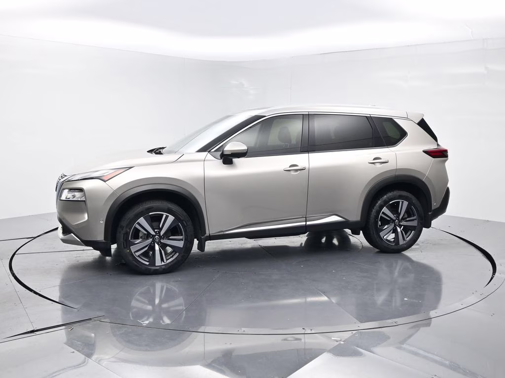 2023 Champagne Silver Metallic Nissan Rogue Platinum FWD SUV