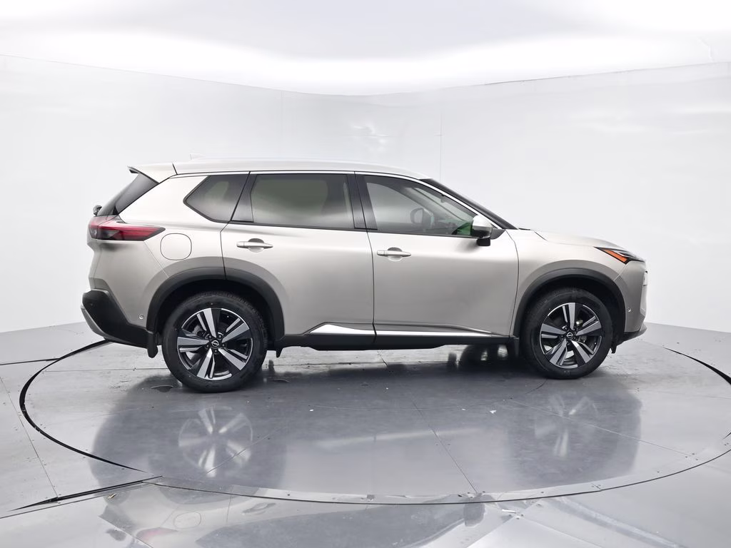 2023 Champagne Silver Metallic Nissan Rogue Platinum FWD SUV