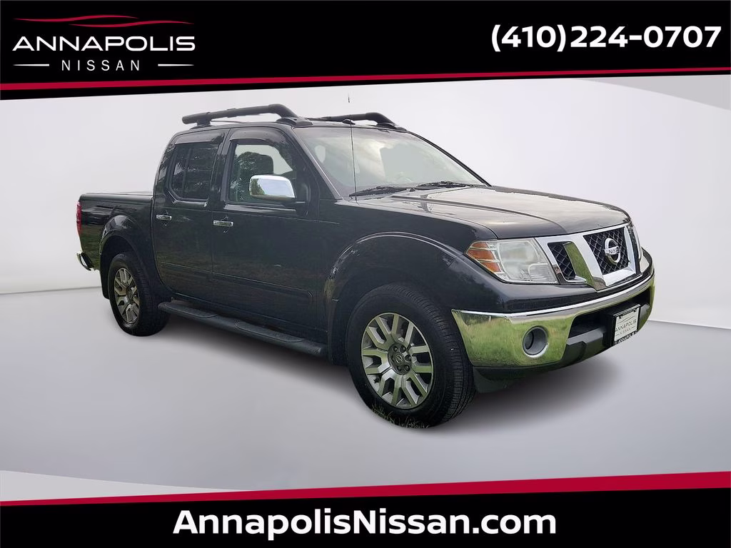 2012 Super Black Metallic Nissan Frontier SL 4X4 Truck