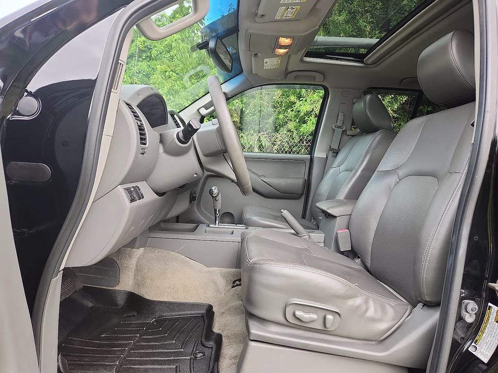 2012 Super Black Metallic Nissan Frontier SL 4X4 Truck