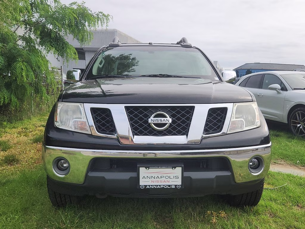 2012 Super Black Metallic Nissan Frontier SL 4X4 Truck