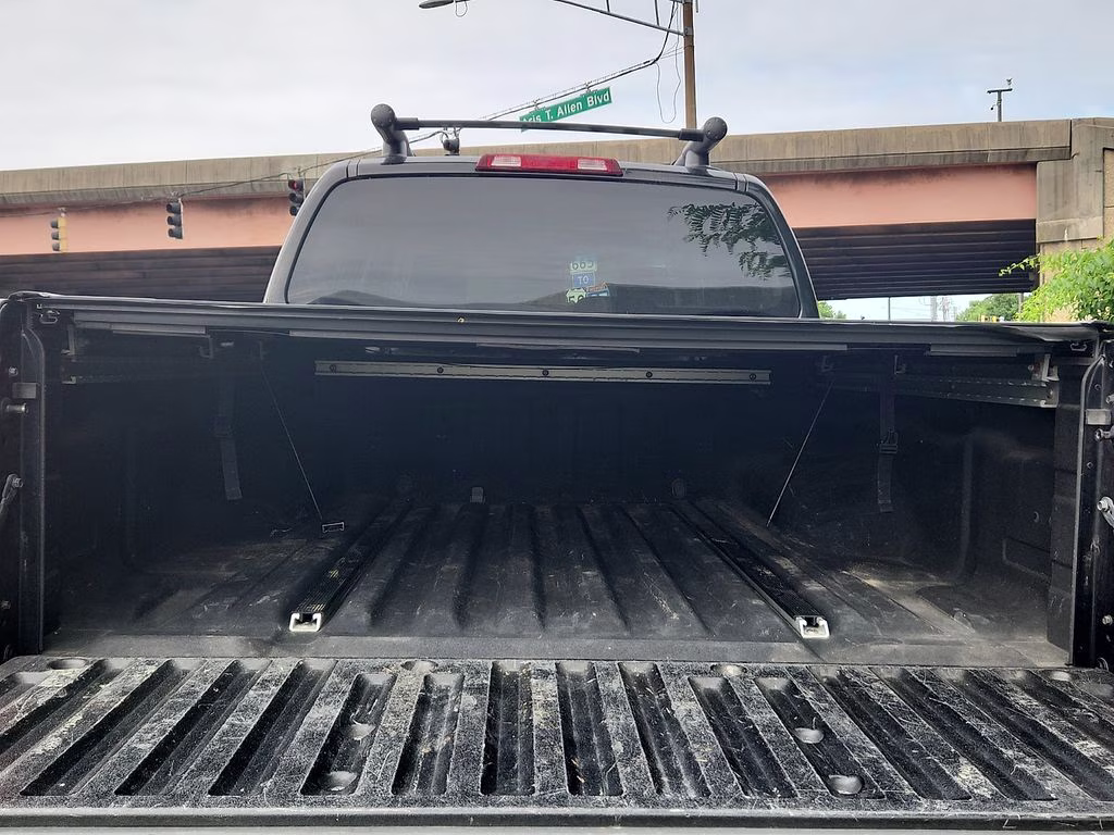 2012 Super Black Metallic Nissan Frontier SL 4X4 Truck