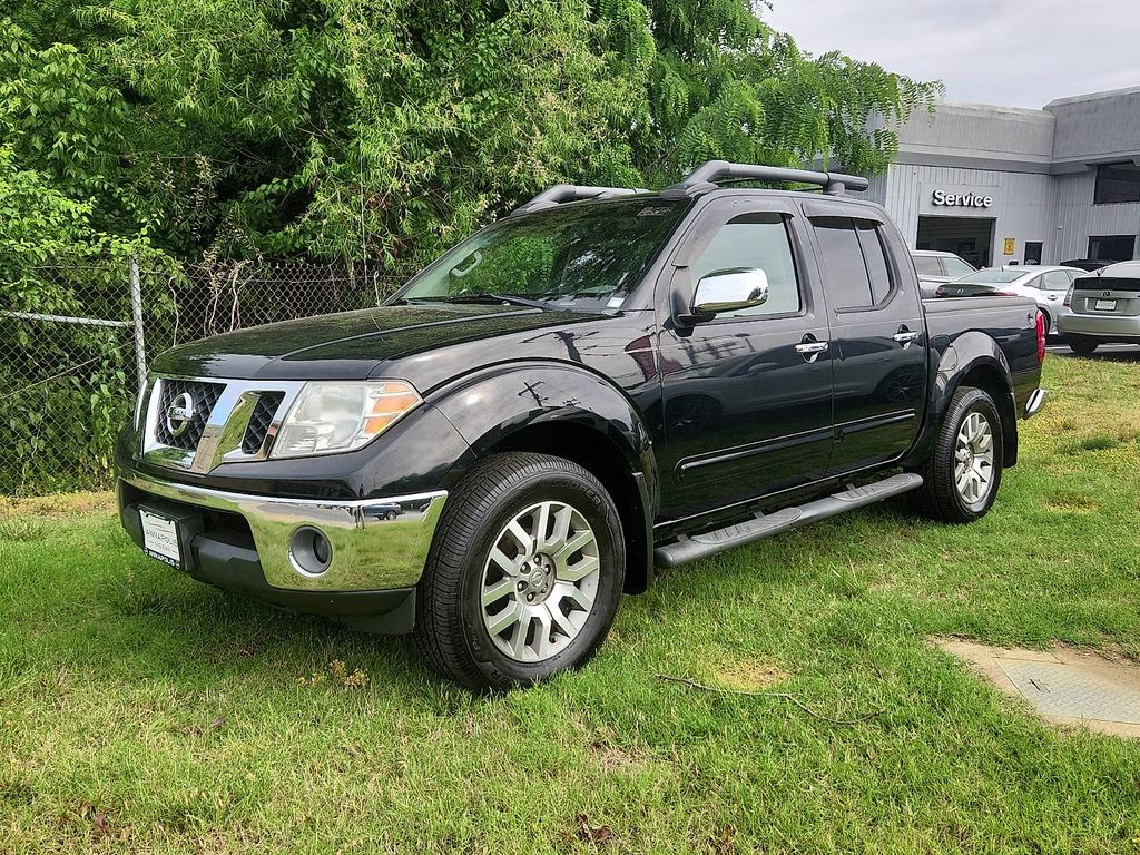 2012 Super Black Metallic Nissan Frontier SL 4X4 Truck