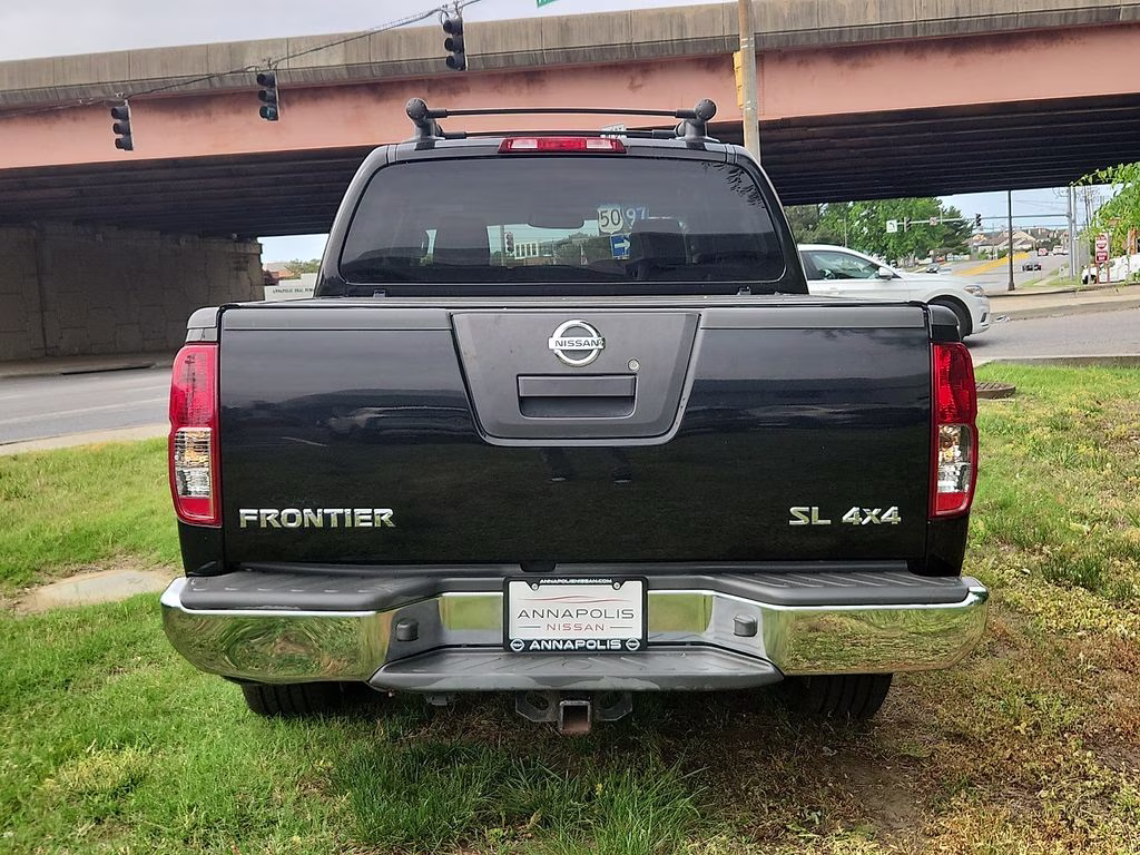 2012 Super Black Metallic Nissan Frontier SL 4X4 Truck