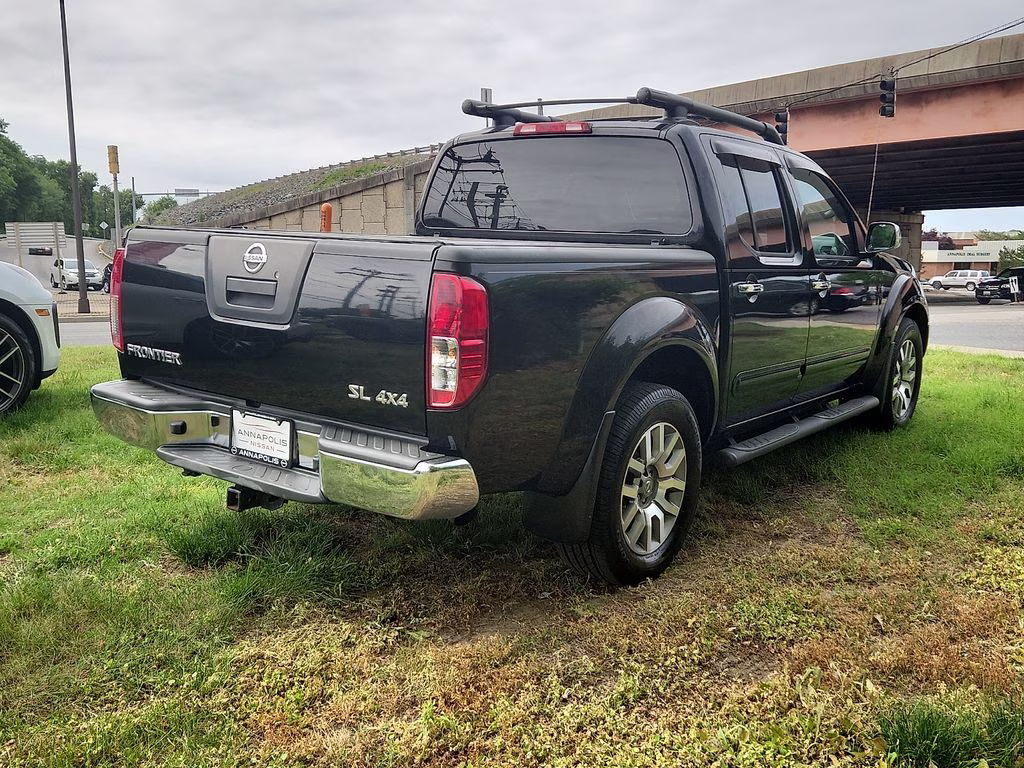 2012 Super Black Metallic Nissan Frontier SL 4X4 Truck