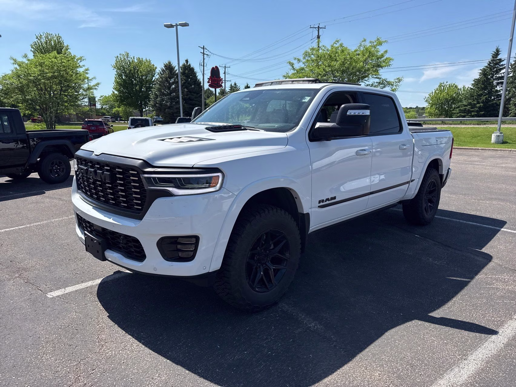 2025 Bright White Clearcoat Ram 1500 Tungsten 4X4 Truck