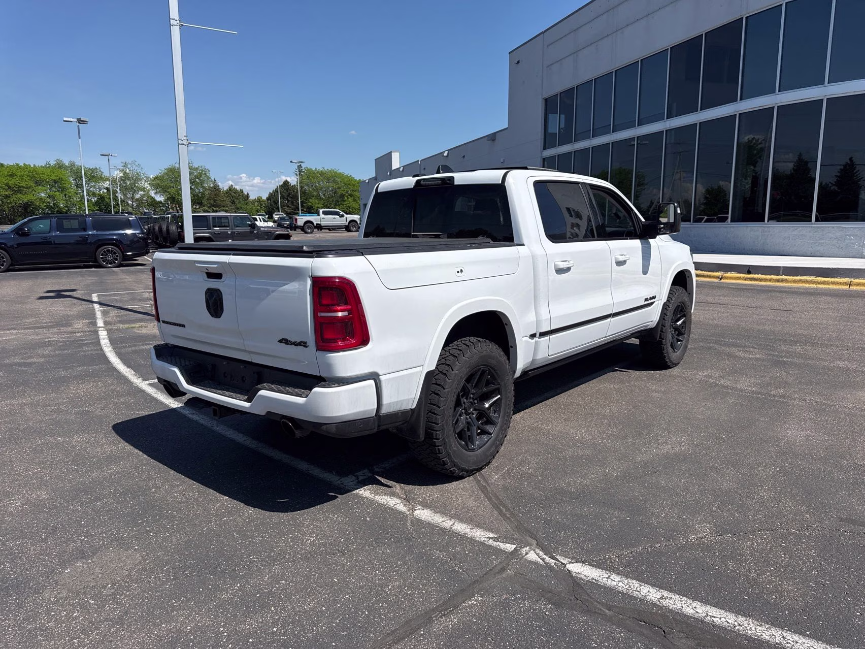 2025 Bright White Clearcoat Ram 1500 Tungsten 4X4 Truck