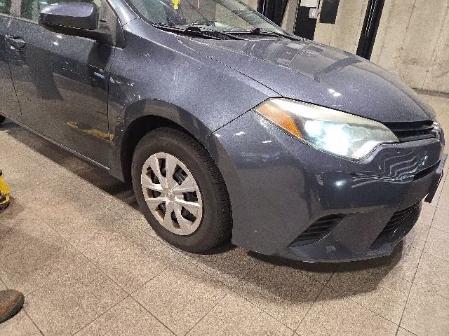 2015 Blue Toyota Corolla L FWD Sedan