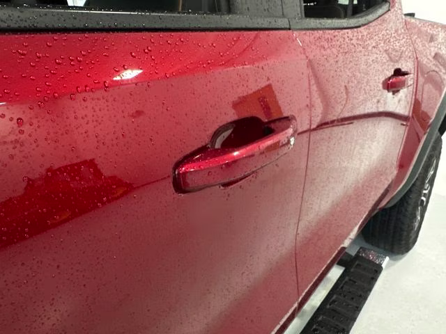 2024 Volcanic Red Tintcoat GMC Canyon AT4 4X4 Truck