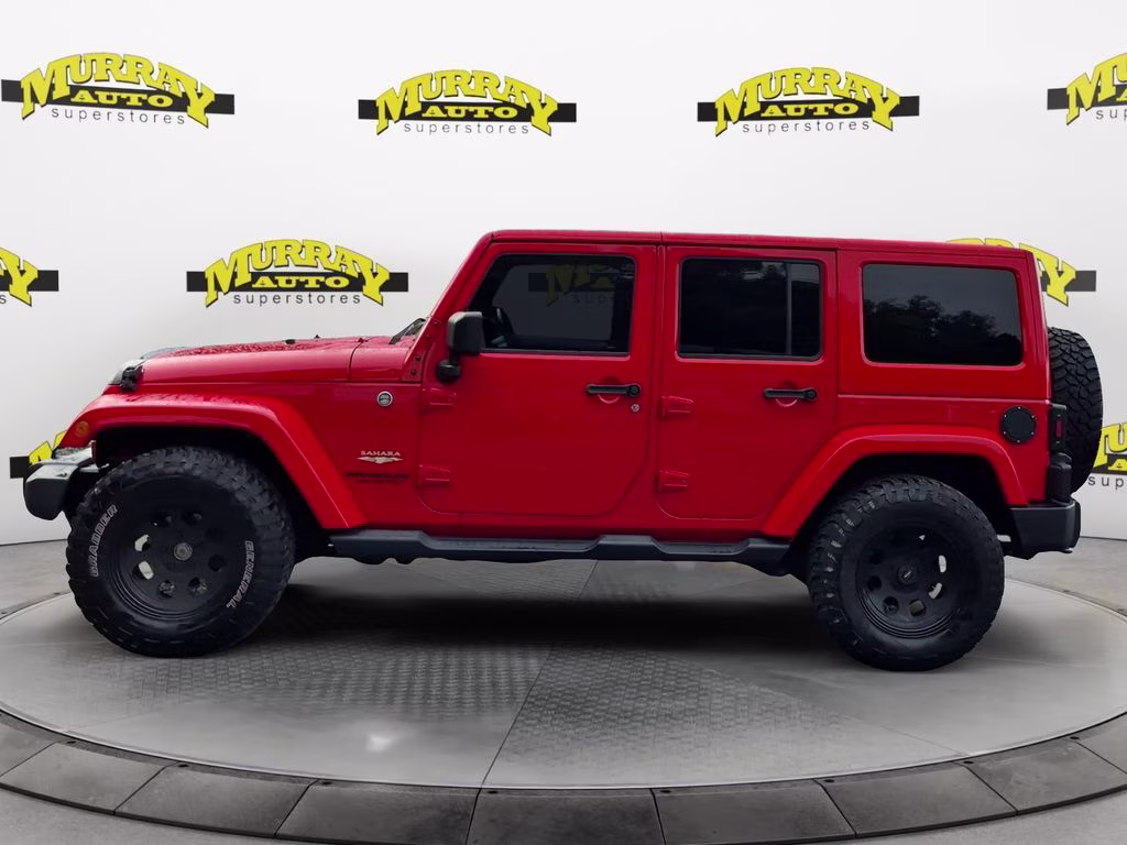 2015 Firecracker Red Clear Coat Jeep Wrangler Unlimited Sahara 4X4 SUV