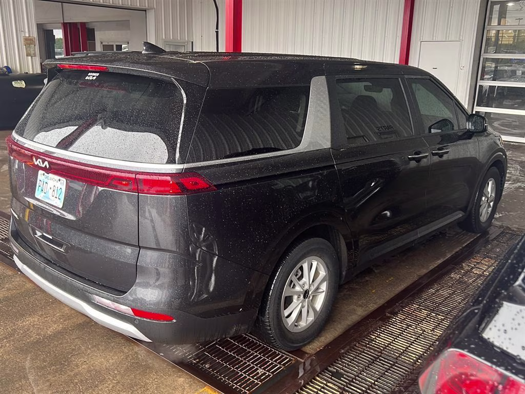 2024 Aurora Black Pearl Kia Carnival LX FWD Van