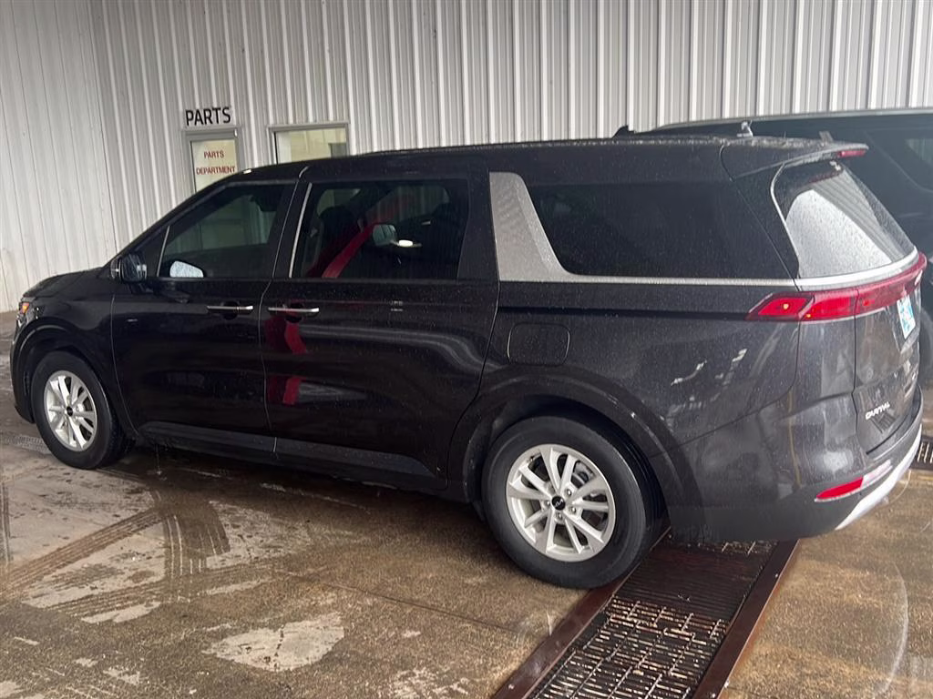 2024 Aurora Black Pearl Kia Carnival LX FWD Van