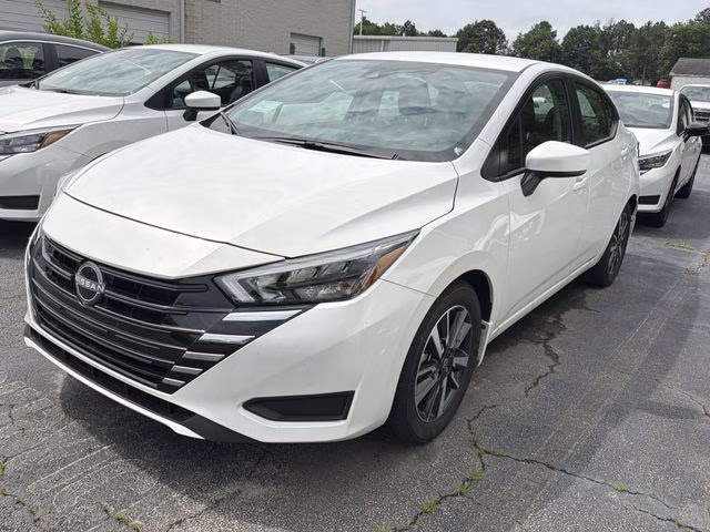 2025 Aspen White Tricoat Nissan Versa 1.6 SV FWD Sedan