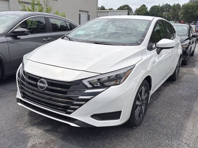 2025 Aspen White Tricoat Nissan Versa 1.6 SV FWD Sedan