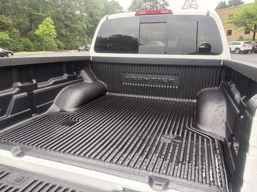 2026 Glacier White Nissan Frontier SV RWD Truck