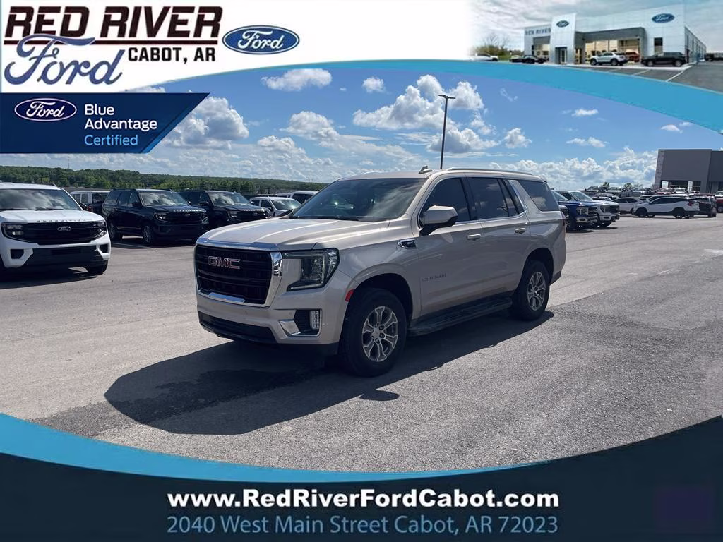 2023 Pearl Beige Metallic GMC Yukon SLE RWD SUV