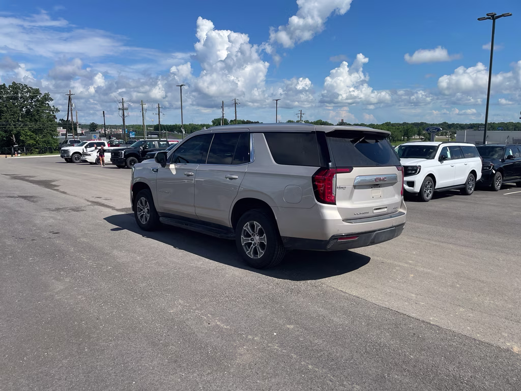 2023 Pearl Beige Metallic GMC Yukon SLE RWD SUV