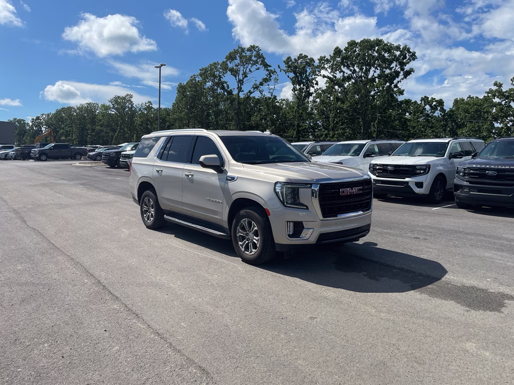 2023 Pearl Beige Metallic GMC Yukon SLE RWD SUV