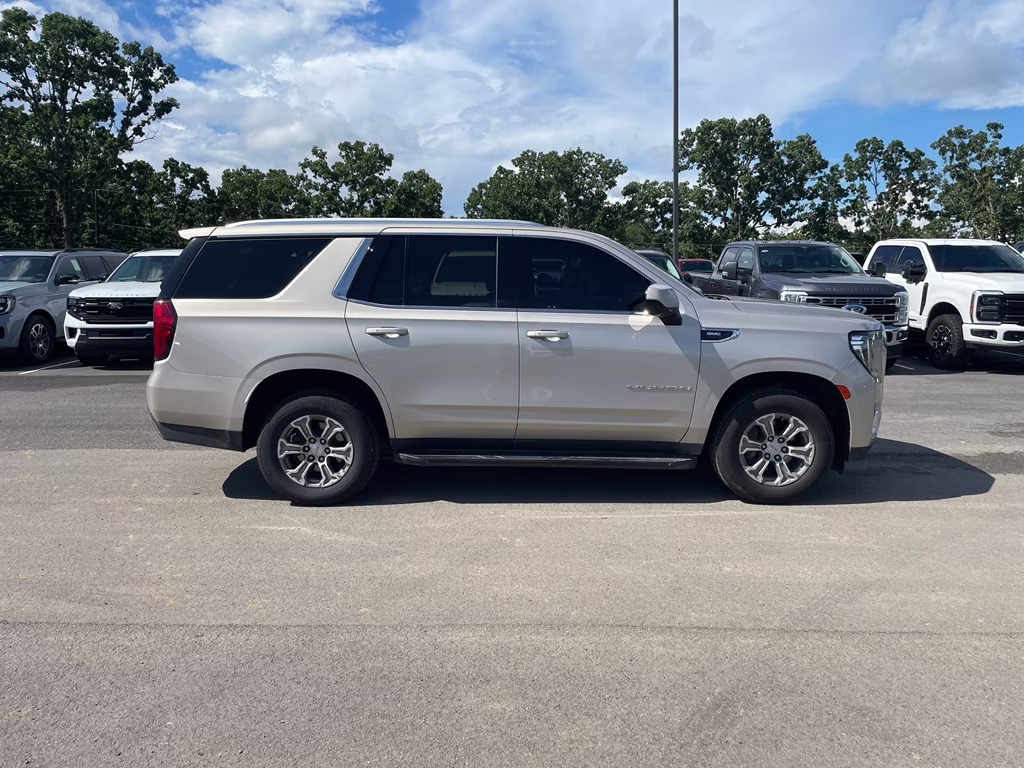 2023 Pearl Beige Metallic GMC Yukon SLE RWD SUV