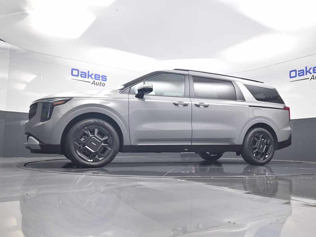 2026 Ceramic Silver Kia Carnival Hybrid EX FWD Van