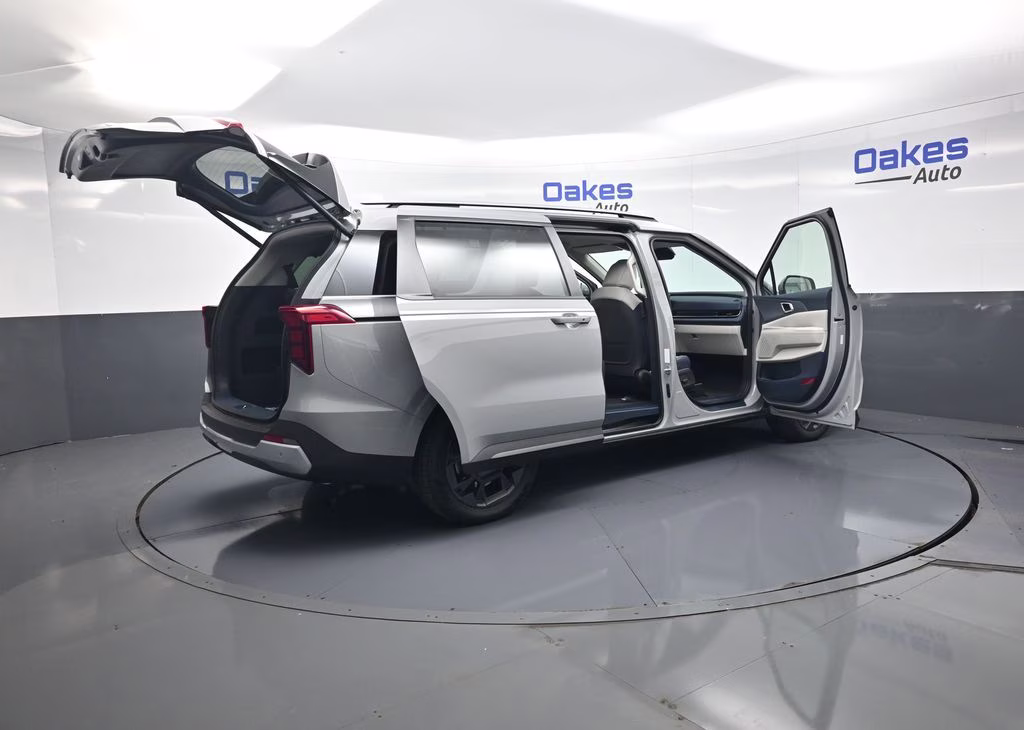 2026 Ceramic Silver Kia Carnival Hybrid EX FWD Van