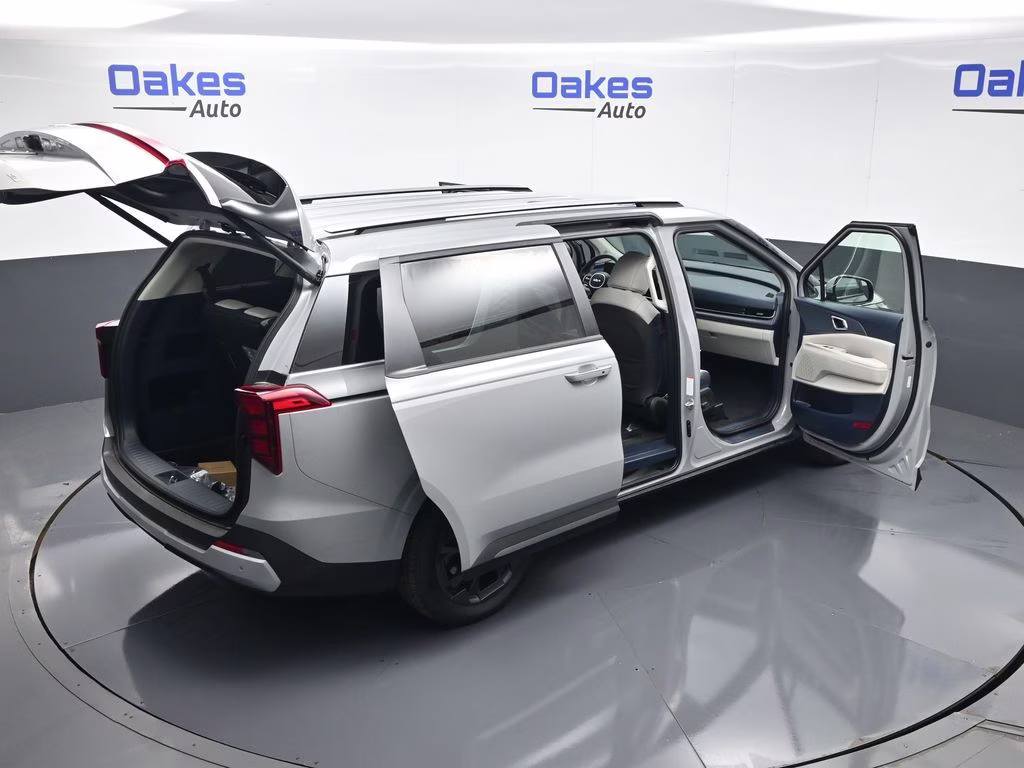 2026 Ceramic Silver Kia Carnival Hybrid EX FWD Van