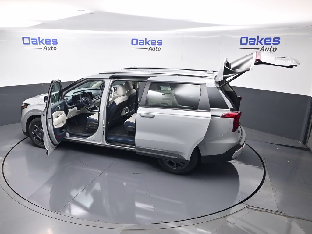 2026 Ceramic Silver Kia Carnival Hybrid EX FWD Van