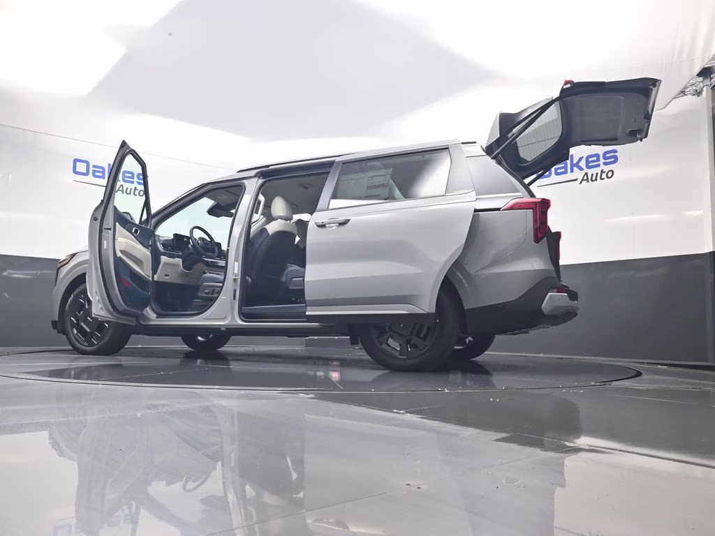 2026 Ceramic Silver Kia Carnival Hybrid EX FWD Van