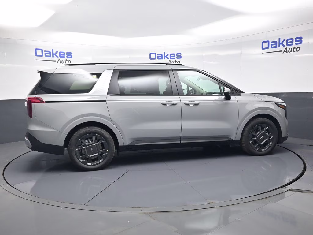 2026 Ceramic Silver Kia Carnival Hybrid EX FWD Van